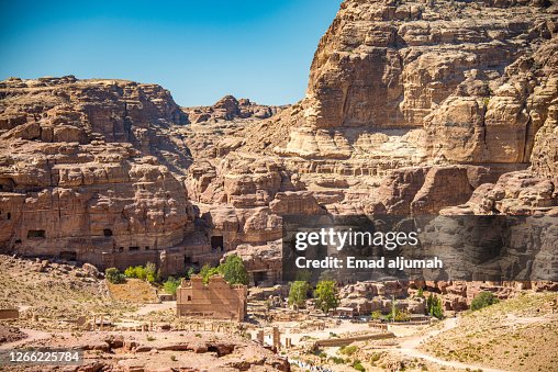 The Tourists Exploring the Qasr al-Bint at the foot of Jabal al-Habis, Petra, Jordan