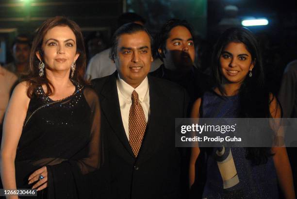 Neeta Ambani, Mukesh Ambani,Anant Ambani and Isha Ambani attend the IPL opening celebration on March 11, 2010 in Mumbai, India.