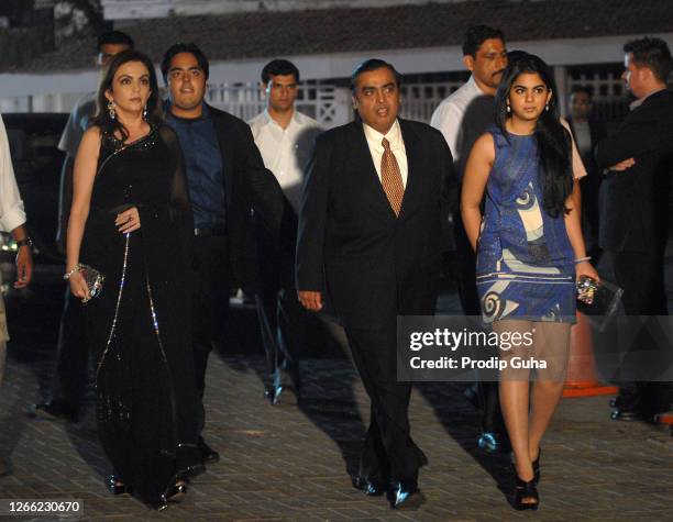 Neeta Ambani, Anant Ambani, Mukesh Ambani and Isha Ambani attend the IPL opening celebration on March 11, 2010 in Mumbai, India.