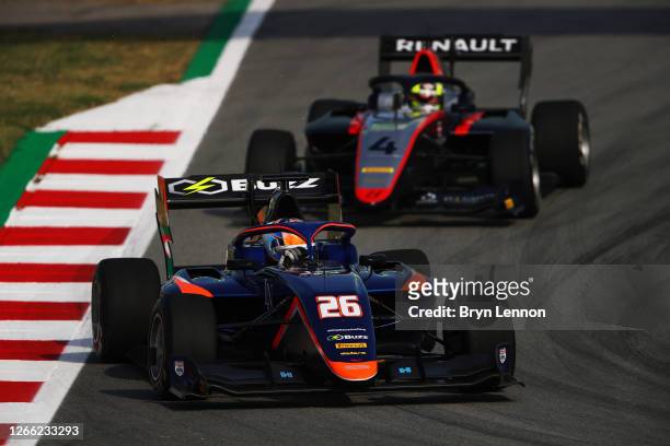 Clement Novalak of Great Britain and Carlin Buzz Racing leads Max Fewtrell of Great Britain and Hitech Grand Prix during practice for the Formula 3...