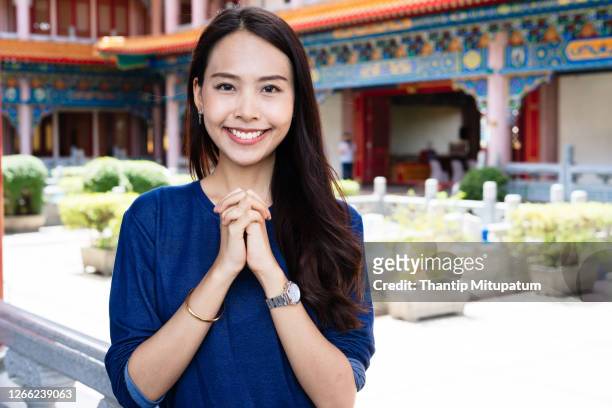 buddhist religion concept,religious asian buddhist woman praying - humility stockfoto's en -beelden