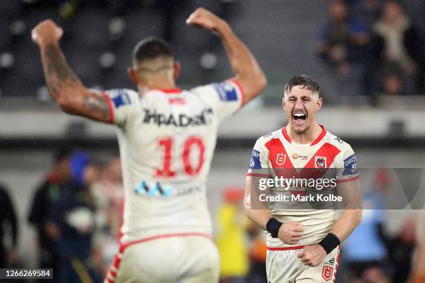 Zac Lomax of the Dragons and Josh Kerr of the Dragons celebrate winning the round 14 NRL match between the Parramatta Eels and the St George...