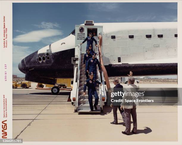 The crew of NASA's STS-30 mission leave the Space Shuttle Atlantis, Orbiter Vehicle 104, at Edwards Air Force Base in California, after landing on...