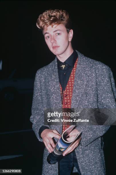 American guitarist, singer and songwriter Brian Setzer at an ARMS Charity Concert in aid of Action into Research for Multiple Sclerosis, 1983.