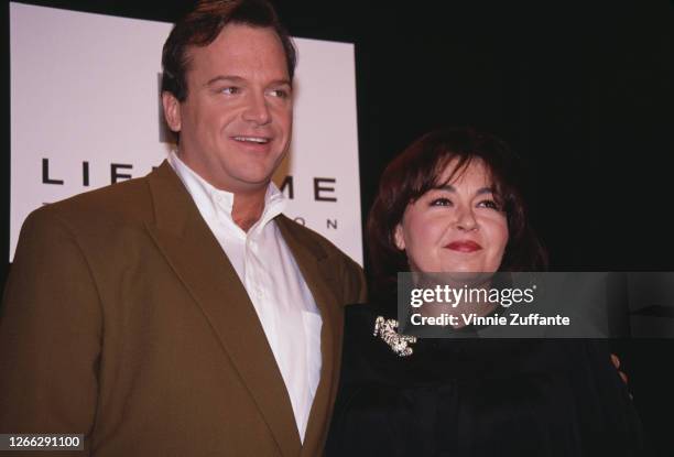 American actor and comedian Tom Arnold with his wife, actress and comedian Roseanne Barr at a 'Free to Laugh' Amnesty International benefit in...