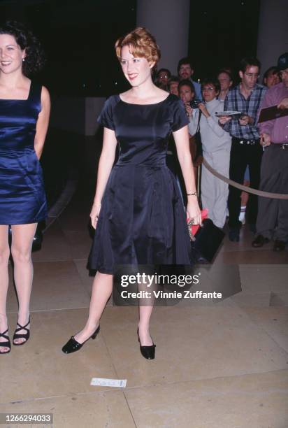 American actors Lauren Graham and Molly Ringwald at the Environmental Media Awards in Beverly Hills, California, 14th October 1996.