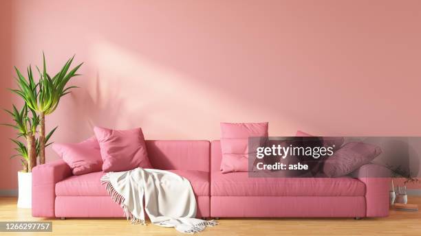 pink living room with sofa - pastel room stock pictures, royalty-free photos & images