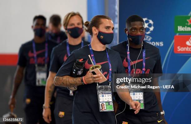 Antoinne Griezmann of FC Barcelona and Ousmane Dembele of FC Barcelona arrive at the stadium prior to the UEFA Champions League Quarter Final match...