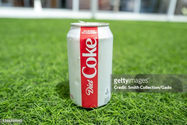 Can of Diet Coke from Coca Cola on artificial grass surface outdoors, San Ramon, California, July 22, 2020.