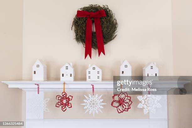 mantel decorated for christmas - mantelpiece stock pictures, royalty-free photos & images