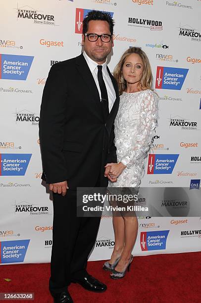 Johnny Littlefield and Nadine Stenovitch attend ABC's "Extreme Makeover: Home Edition" Season 9 Premiere on September 25, 2011 in Los Angeles,...