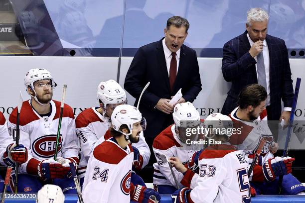 Associate Coach Kirk Muller of the Montreal Canadiens shouts from the bench against the Philadelphia Flyers during the first period in Game Two of...