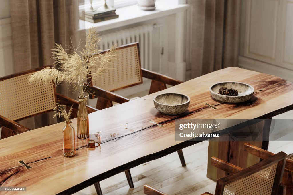 3d rendering of rough edge plank dining table