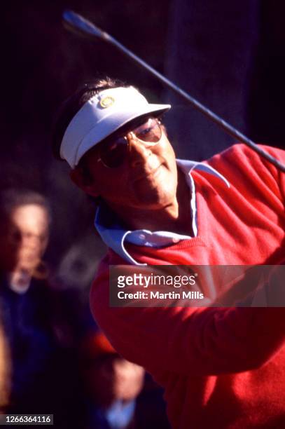 Golfer Arnold Palmer of the United States follows his shot during a golf event circa 1970.