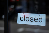 Closed sign in a shop window, central London during Covid-19 pandemic.