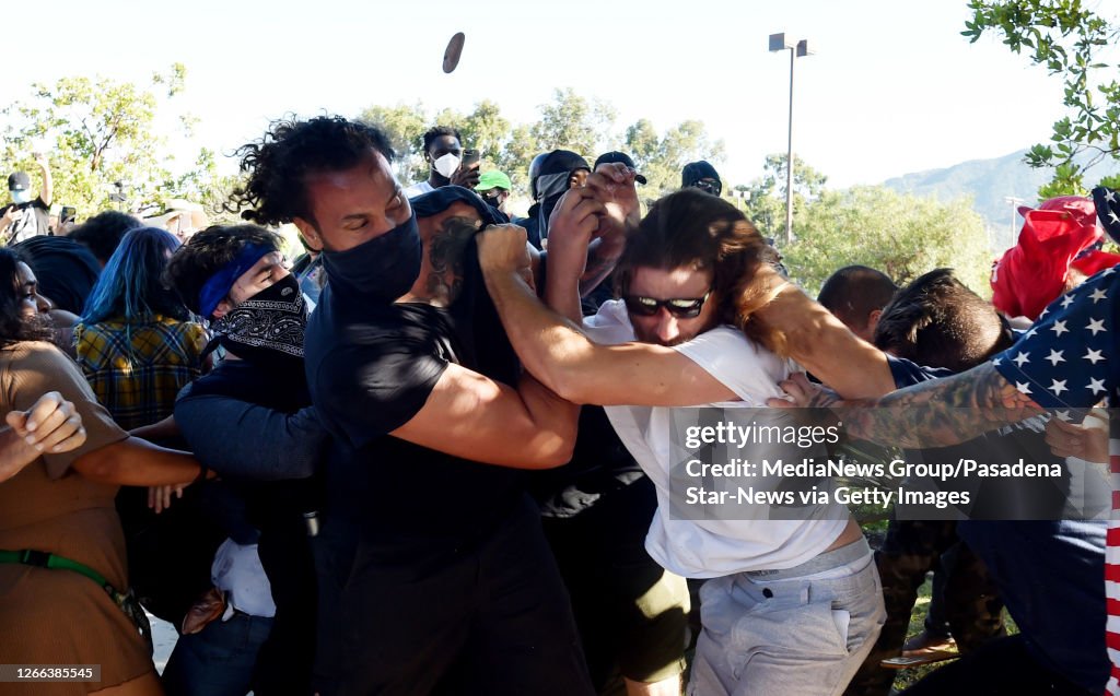 Pro Trump supporters clash with Black Lives Matter protestors during a rally in Tujunga, California.