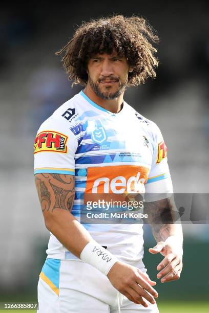 Kevin Proctor of the Titans warms up ahead of the round 14 NRL match between the Cronulla Sharks and the Gold Coast Titans at Netstrata Jubilee...