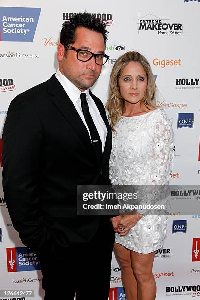 Actors Johnny Littlefield and Nadine Stenovitch attend the premiere of ABC's "Extreme Makeover: Home Edition" Season 9 at Vibiana on September 25,...