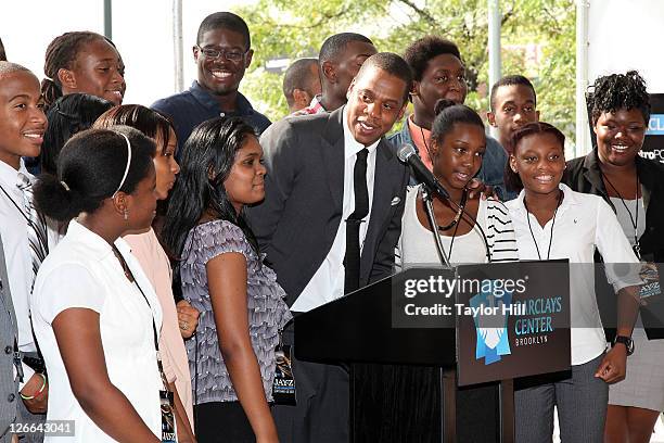 Brooklyn Nets co-owner Shawn Carter brings onstage high school students at George Westinghouse Career and Technical Education High School, his alma...