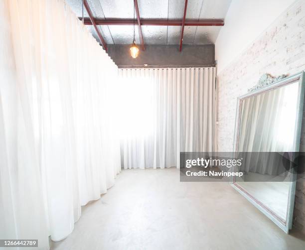 industrial loft apartment, fitting room - fitting room stock pictures, royalty-free photos & images