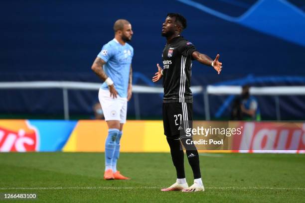Maxwel Cornet of Olympique Lyon celebrates after scoring his team's first goal during the UEFA Champions League Quarter Final match between...