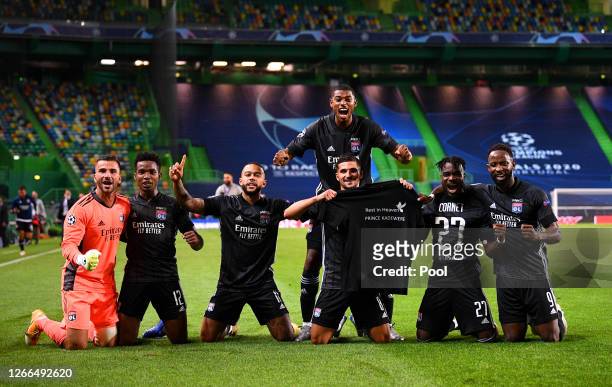 Olympique Lyon players show respects for teammate Tino Kadewere, following the death of his brother, Prince Kadewere, as they celebrate following...