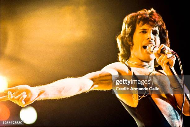 Singer Freddie Mercury of Queen performs Live at the Forum on March 3, 1977 in Inglewood California.