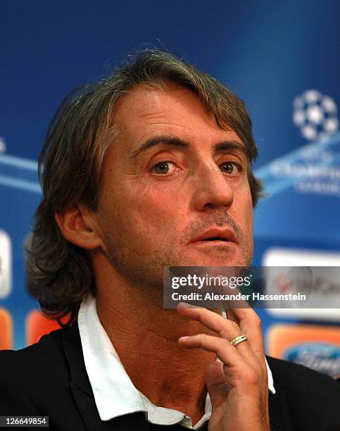 Roberto Mancini, head coach of Manchester City looks on during a press conference ahead of the UEFA Champions League group A first leg match against...