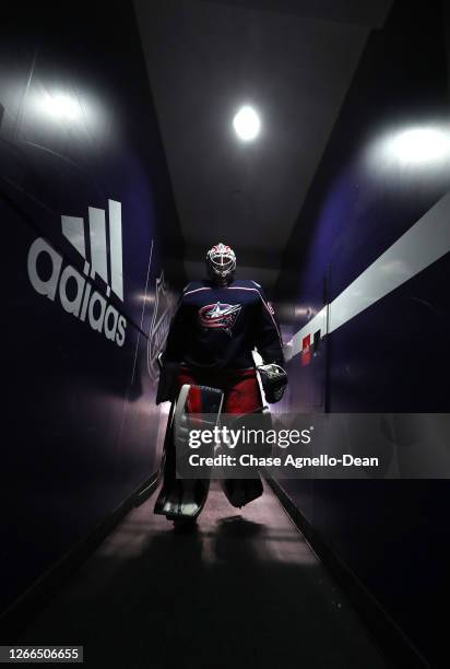 Goaltender Matiss Kivlenieks of the Columbus Blue Jackets walks back to the locker room after warm-up before Game Three of the Eastern Conference...