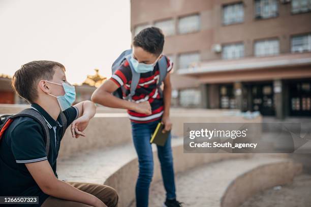 Boy Hugging Backpack Photos and Premium High Res Pictures - Getty Images