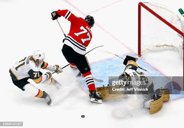 Marc-Andre Fleury of the Vegas Golden Knights makes the first period save on Kirby Dach of the Chicago Blackhawks in Game Three of the Western...