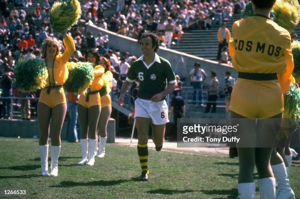 Franz Beckenbauer of New York Cosmos runs onto the pitch before a North American Soccer League match. \ Mandatory Credit: Tony Duffy/Allsport