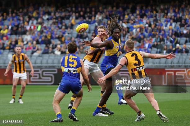 Ben McEvoy of the Hawks and Nic Naitanui of the Eagles contests the ruck during the round 12 AFL match between the West Coast Eagles and the Hawthorn...