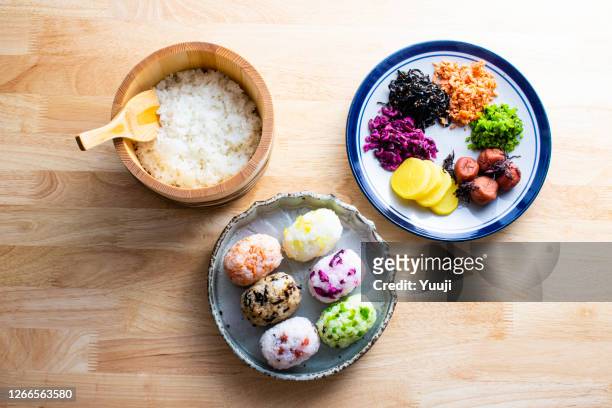 a colorful japanese rice ball recipe made with various ingredients - rice ball stock pictures, royalty-free photos & images