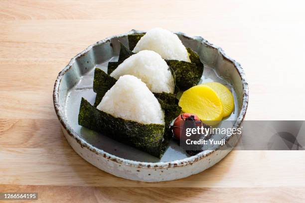 a colorful japanese rice ball recipe made with various ingredients - rice ball stock pictures, royalty-free photos & images