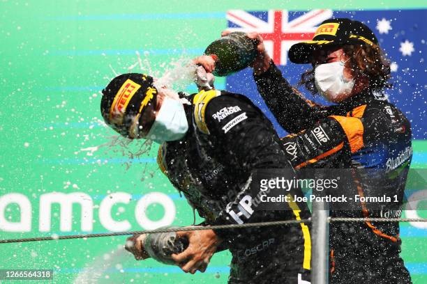 Race winner Oscar Piastri of Australia and Prema Racing and second placed Alex Peroni of Australia and Campos Racing celebrate on the podium during...
