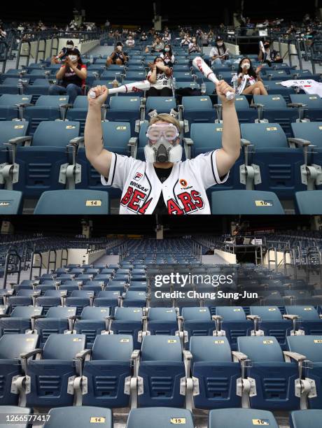 Image Numbers 1258716576 and 1266572045 In this composite image has been made between the day Korean Baseball first accepted fans after the...