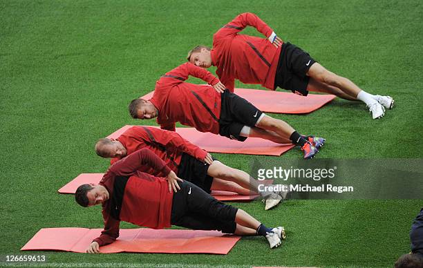 Alexander Frei, Scott Chipperfield, Markus Steinhofer and Radoslav Kovac warm up during the Basle training session ahead of their UEFA Champions...