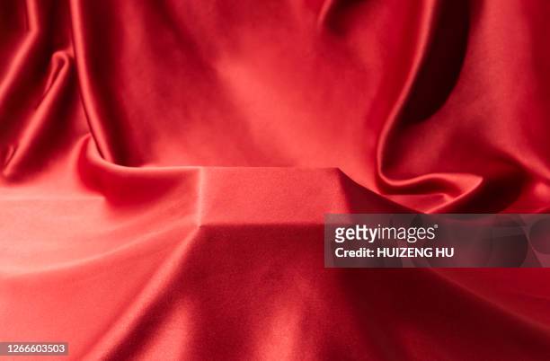 square platform covered with silk cloth - red silk stock pictures, royalty-free photos & images