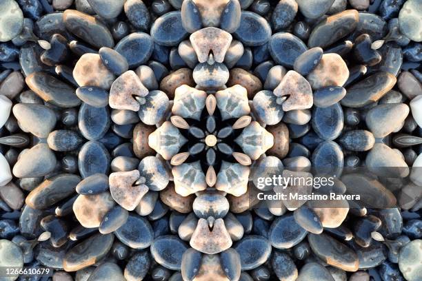 kaleidoscopic composition of pebbles. - mandala stockfoto's en -beelden