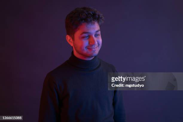 neon portrait of a young attractive man - art modeling studios stock pictures, royalty-free photos & images