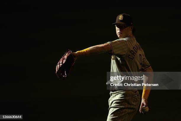 Jake Cronenworth of the San Diego Padres warms up before the MLB game against the Arizona Diamondbacks at Chase Field on August 15, 2020 in Phoenix,...