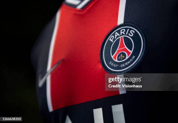 The Paris Saint-Germain club crest on the first team home shirt on August 13, 2020 in Manchester, United Kingdom.