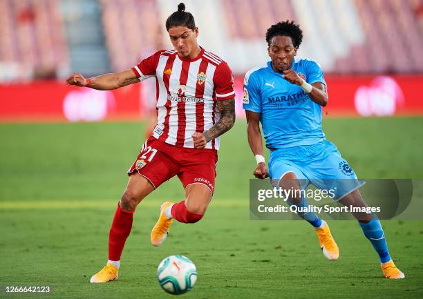 Darwin Nunez of Almeria competes for the ball with Johan Andres Mojica Palacios of Girona during the La Liga Smartbank Playoffs match between Almeria...