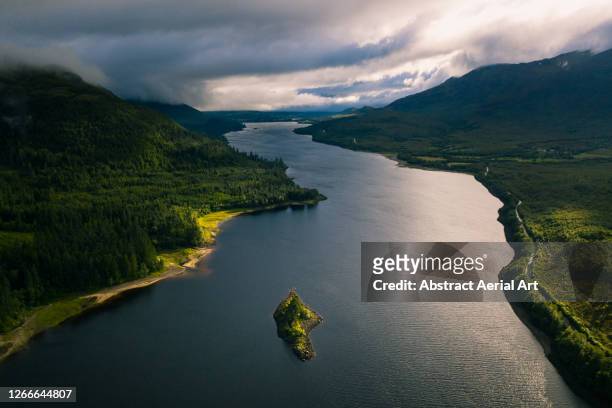 high angle perspective showing an island in a loch, scottish highlands, united kingdom - scotland stock pictures, royalty-free photos & images