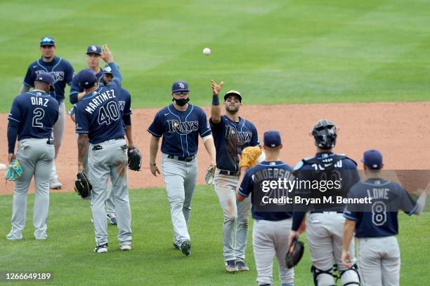 The Tampa Bay Rays celebrate after defeating the Toronto Blue Jays 3-2 at Sahlen Field on August 16, 2020 in Buffalo, New York. This game is a...