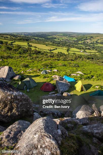 wild campers in dartmoor national park - devon stock pictures, royalty-free photos & images