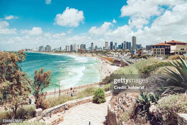 panoramic view of tel aviv from historic district of jaffa - tel aviv stock-fotos und bilder