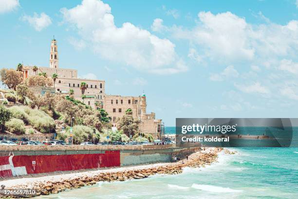 view of old jaffa against mediterranean sea - jaffa stockfoto's en -beelden