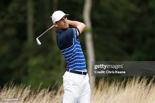 Billy Horschel of the United States plays his shot from the 12th tee during the final round of the Wyndham Championship at Sedgefield Country Club on...